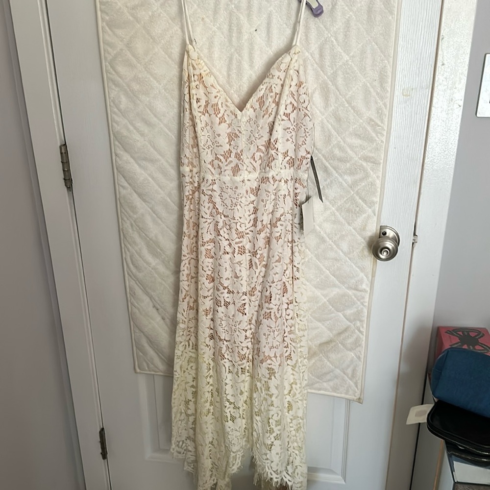 Lulus dress size small with lace. Never worn